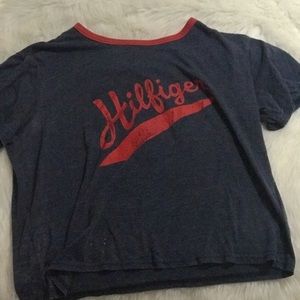 This is a blue and red Tommy Hilfiger shirt.